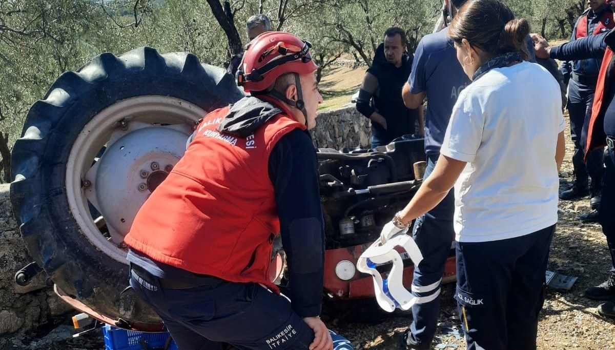 balikesirde traktor devrildi surucu yaralandi YTURG3Yx